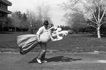 84-315; Erik Carrying Papier Mache Woman by Southern Illinois University Edwardsville